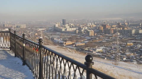 Man with tablet computer on the background of the urban landscape in winter Stock Footage 61179619