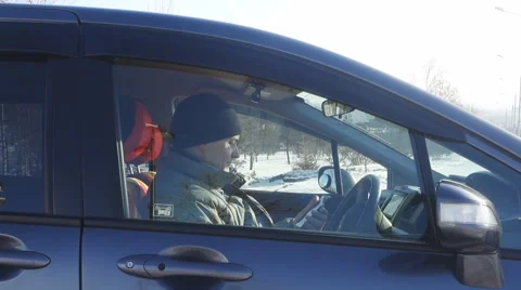 Man with tablet computer in car Stock Footage 61179549