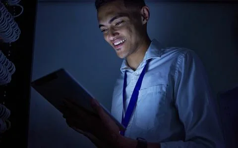 Man, tablet engineering and server room or data center management, system Stock Photos