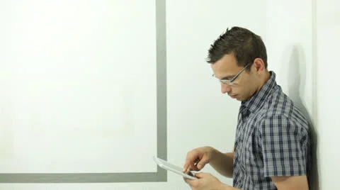 Man with tablet 库存影片 24757075