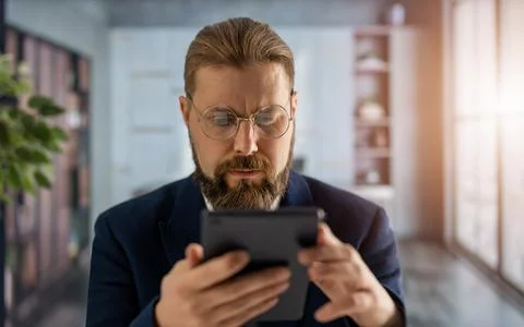 Man with tablet at office Stock Photos
