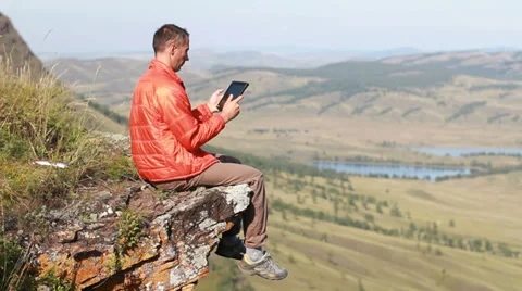 Man with tablet outdoor Stock Footage 30364766