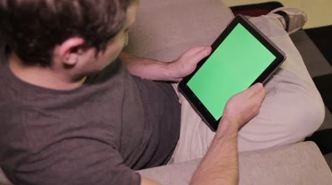 Man on Tablet - Portrait - Green Screen Stock Footage 40260255
