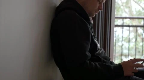 Man on Tablet by Window Stock Footage 40273300