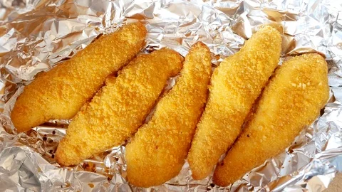Man take chicken strips. Time lapse. Stock Footage 70402366