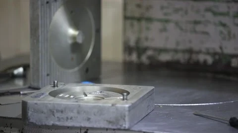 Man take out a casting part of machine in factory, industrial safety first Stock Footage 297739073