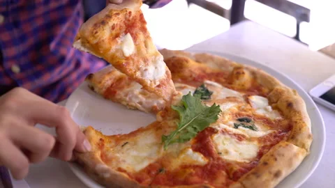 Man take a slice of delicious pizza for eating. close up 4k shooting Stock Footage 130262869