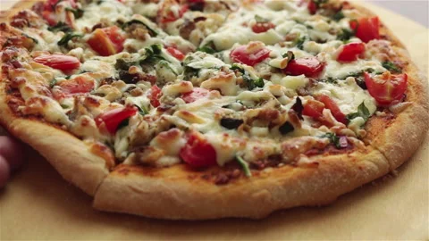 Man take a slice of hot pizza with melting cheese close up Stock-Footage 102883368