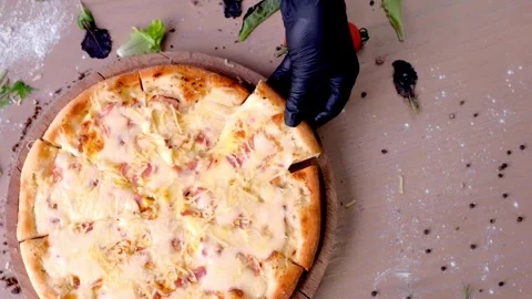 Man take a slice of hot pizza with melting cheese close up macro shot. Pizza and Stock-Footage 336586701