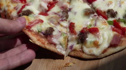Man take tasty pizza slice with melting cheese Stock Footage 102332676