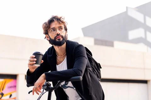 Man takes a break while drinking take away coffee Stock Photos
