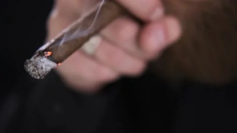 Man takes cigarette and light it up, cigarette smoke, tobacco,caucasian Stock Footage 130227727