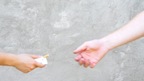 A man takes a cigarette from a pack Stock Footage 94831333
