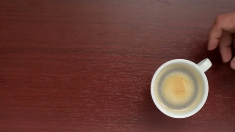 Man takes a cup of coffee Stock Footage 76023301