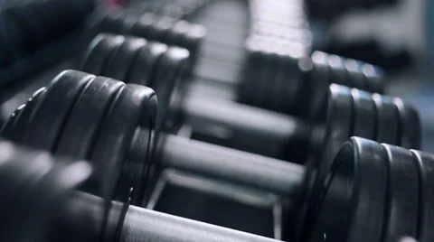 A man takes a dumbbell Stock Footage 50021983