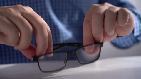 Man Takes Glasses from Work Table. Office work Stock Footage 151530167