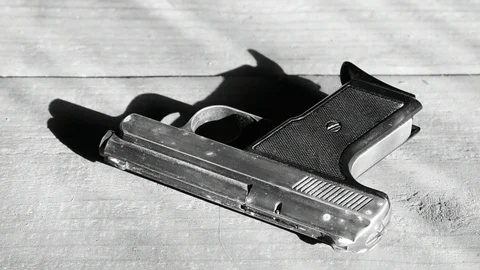 Man takes a gun Stock Footage 110845203