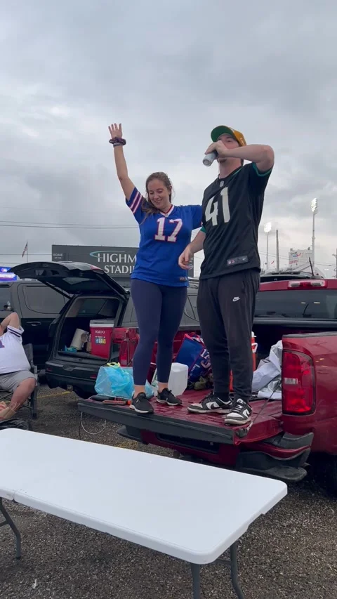 Man Takes Hard Fall While Trying to Jump Through Table, Buffalo, New York, USA - Stock Footage 313297431