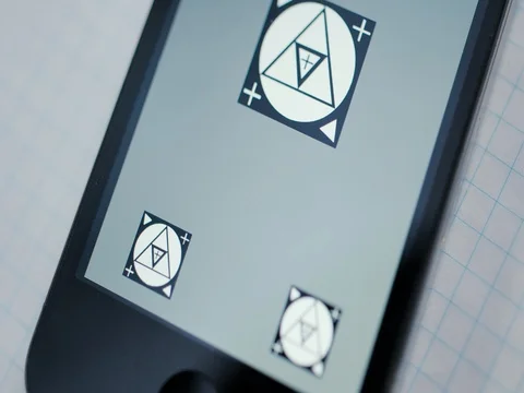 Man takes his smartphone from a table Stock Footage 76323440