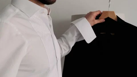 The man takes the jacket Video stock 238374689