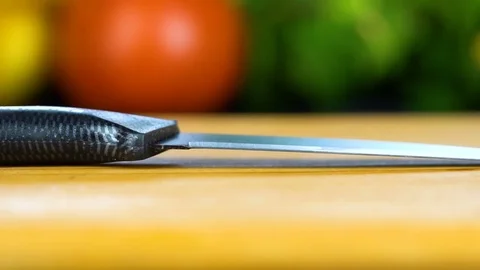 A man takes a knife HD Stock-Footage 85225546