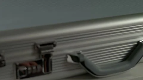 Man takes the money out of the case Stock Footage 68304031