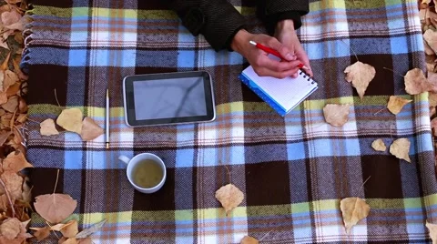 Man takes notes in a diary Stock Footage 56639745