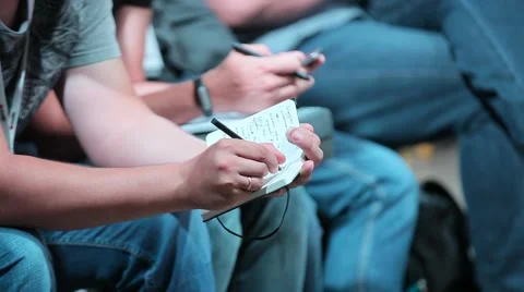 Man takes notes in a notebook at the Conference Stock Footage 68648045
