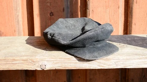 Man takes the old cap Stock Footage 110843373