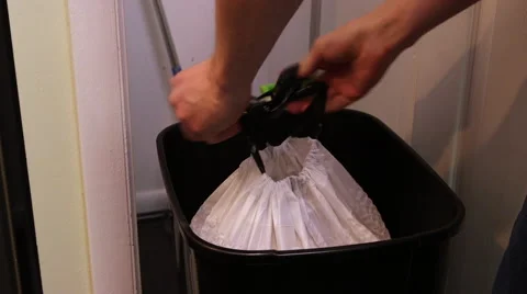 Man takes out kitchen trash Video stock 61402549