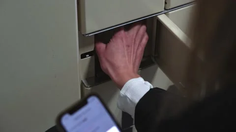 A man takes out a parcel from the post office. online delivery of goods. Stock Footage 223125969