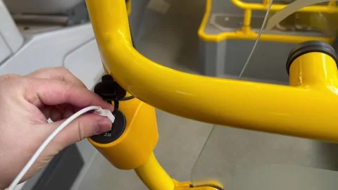 Man takes out wire from USB socket and closes cover of charger for mobile phone Stock Footage 283854966