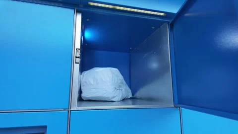 Man Takes Parcel From Locker - Symbol Of Digital Identity And Smart City System Stock Footage 319059679