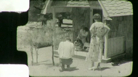 Man TAKES PHOTO Photographer Camera 1930s Vintage Film Retro Home Movie 18mm Stock Footage 12459782