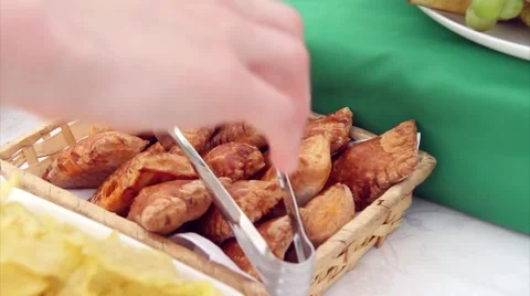 Man takes a pie on the table Stock Footage 43175658