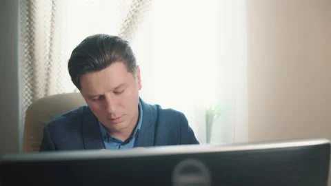 A man takes a pill and drinks water Stock Footage 169645860