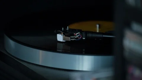 Man takes off record player arm and closes cover Stock-Footage 98739453