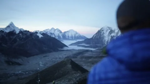 Man Takes Selfie in Front of Mount Everest 動画素材 243024864