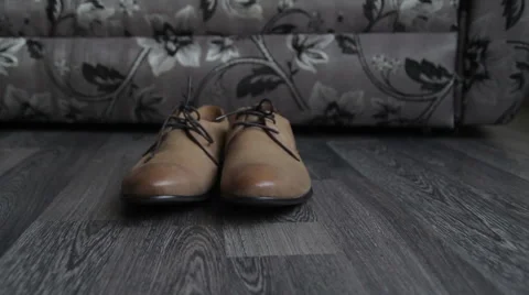 Man takes  shoes, close up Stock Footage 45794500
