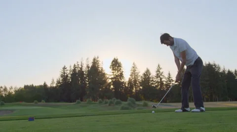 Man takes tee box shot Stock Footage 60196328