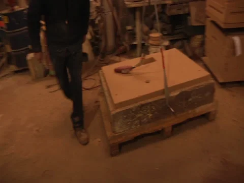 Man Takes Off Top Half Of Mold Stock Footage 1089676