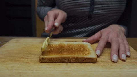 Man takes two loaves of bread Stock Footage 102984081