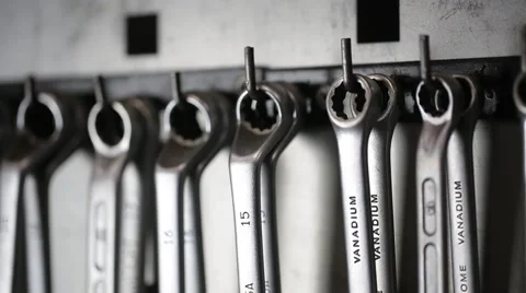 Man takes a wrench and hangs it back 스톡 동영상 59596386