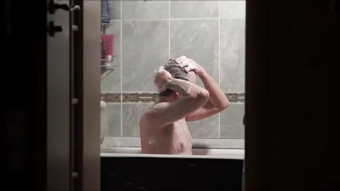 Man taking a bath Stock-Footage 306383407