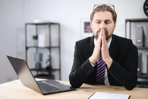 Man taking break during working day at office Stock Photos
