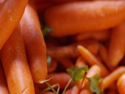 Man taking a carrot Stock Footage 78373915