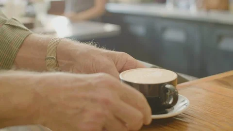 Man taking coffee from the café counter Stock Footage 87806044