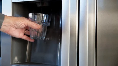 Man taking cooled water from the fridge with sound Video stock 124321574