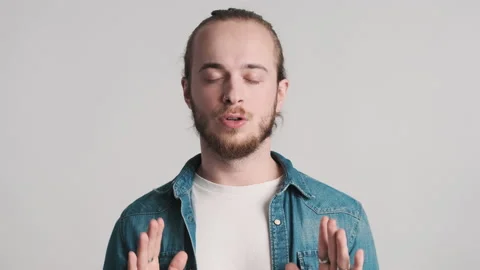 Man taking a deep breath trying to calm down Stock Footage 150342696