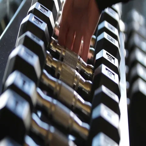 Man taking Dumbbells Video stock 69718657